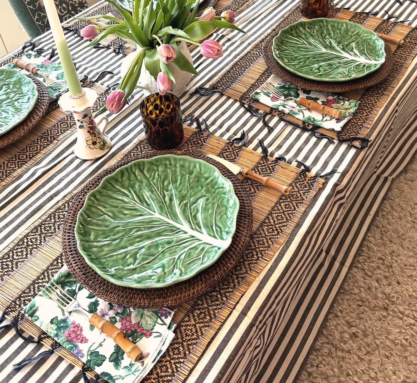 Green cabbage-leaf plates set for lunch at a recent event